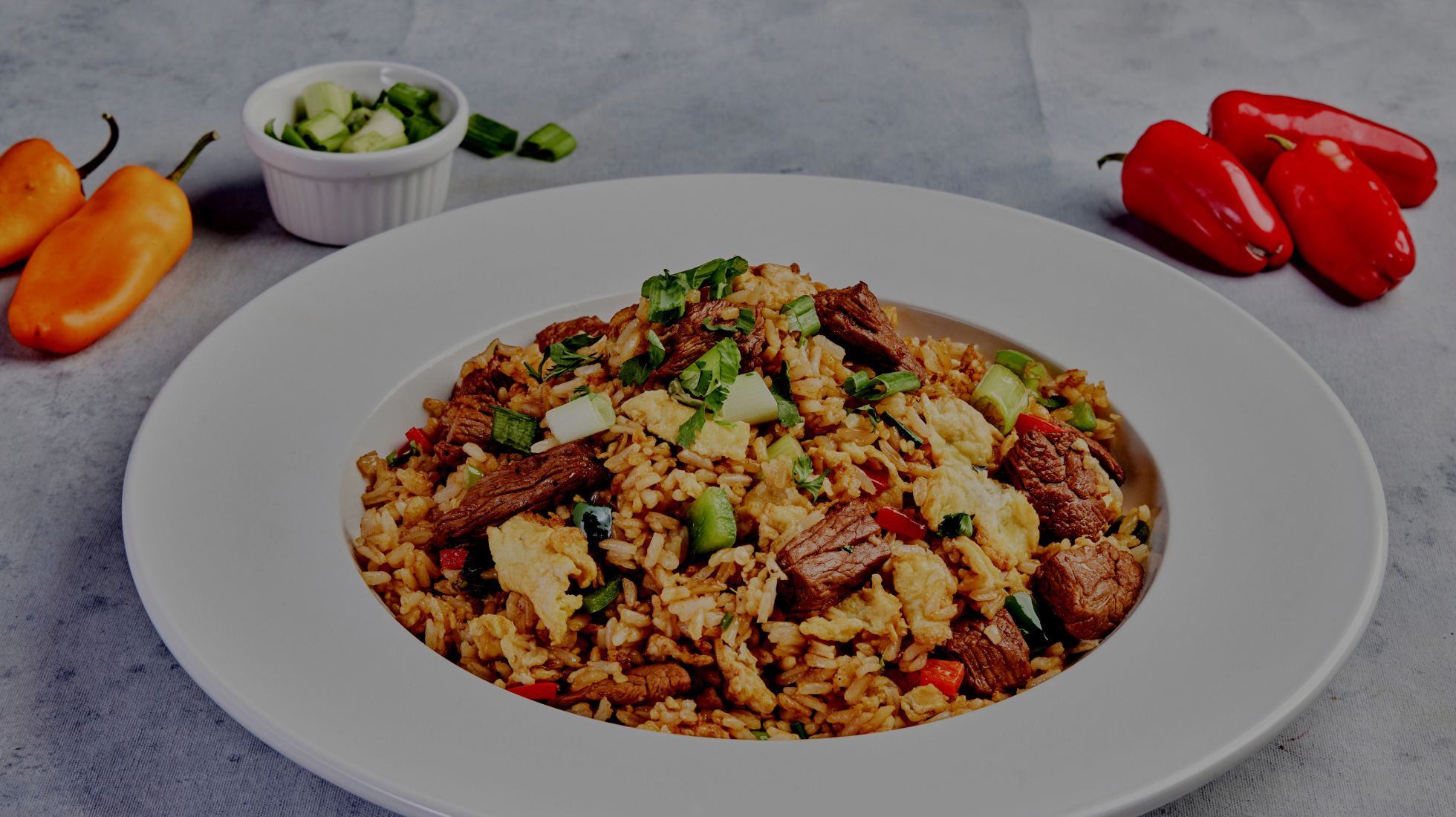 Plate of beef fried rice with peppers